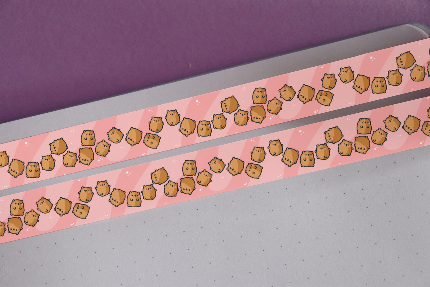 Bear washi tape on notebook and purple table