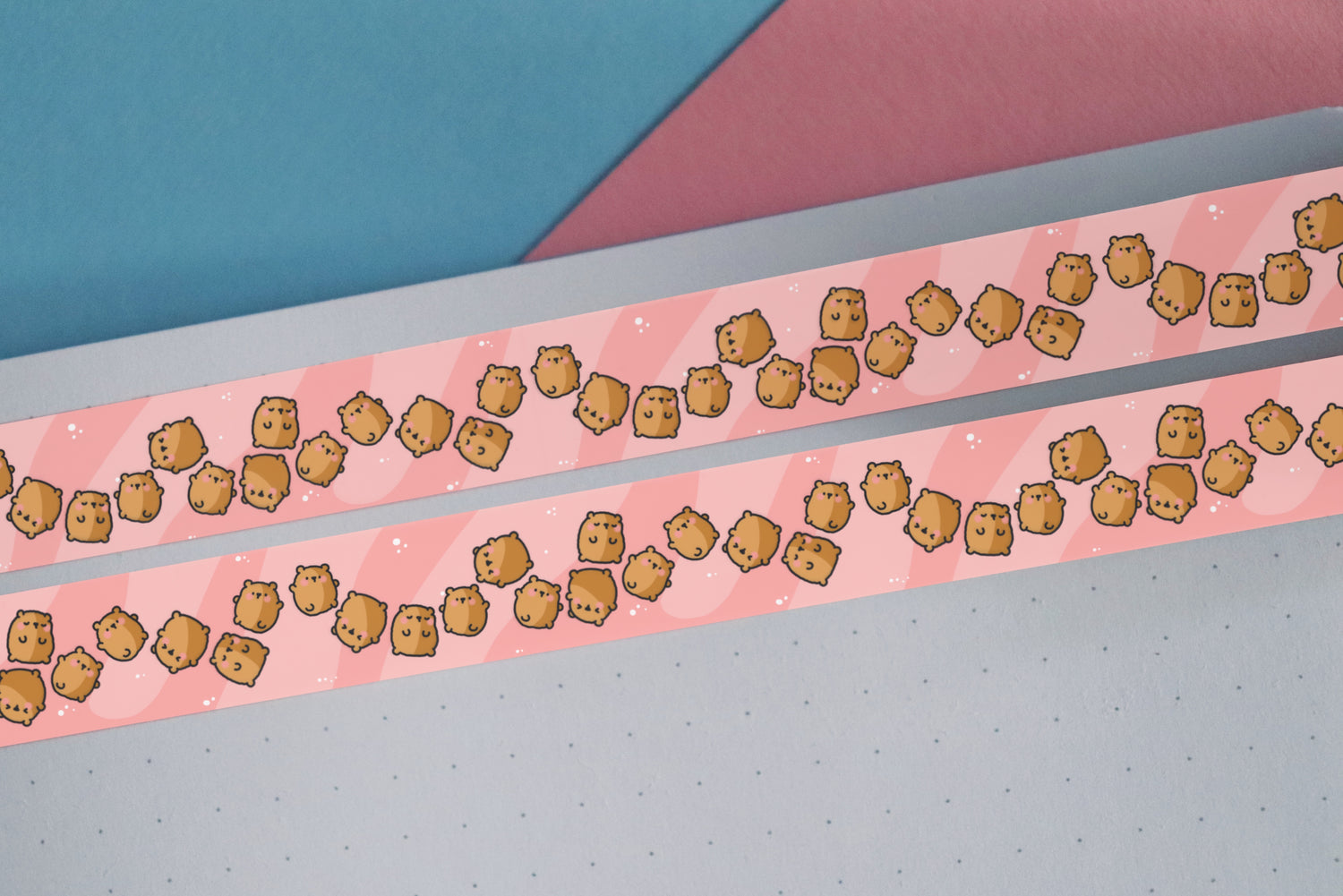 Bear washi tape on notebook and blue and pink table