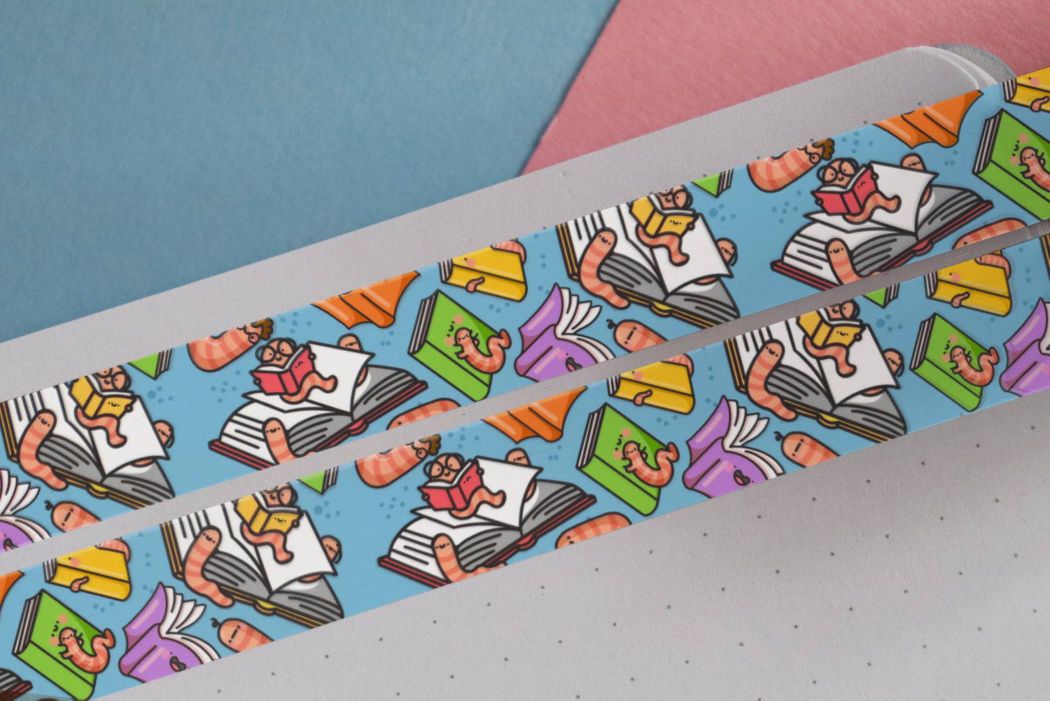 Bookworm washi tape on pink and blue table