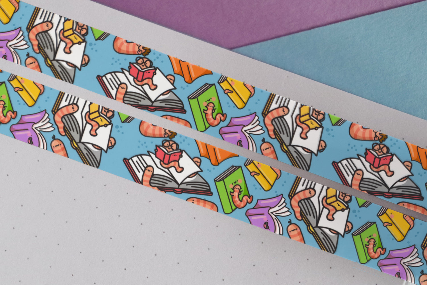 Bookworm washi tape on purple and blue table