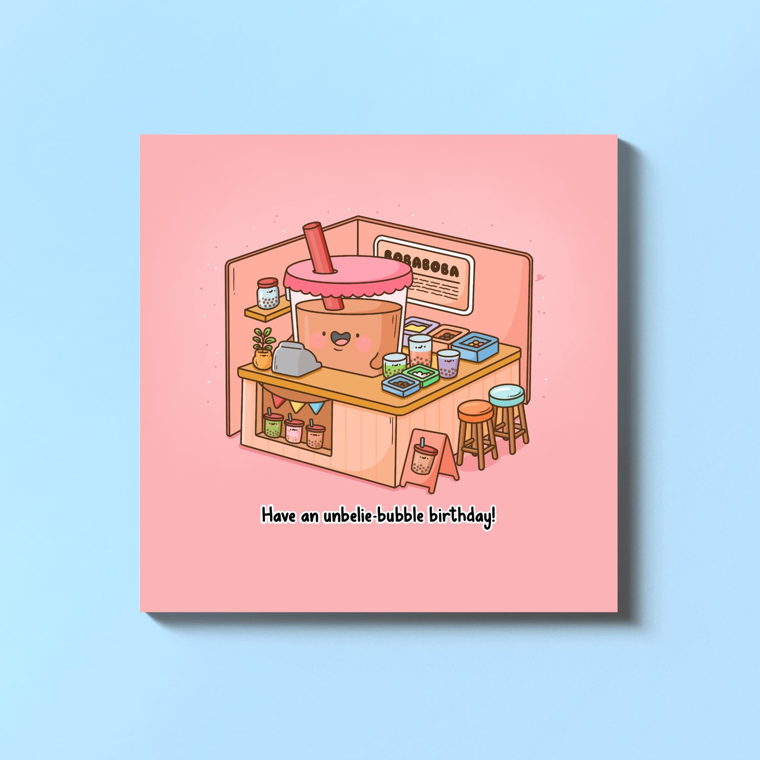 Bubble tea birthday card on blue table