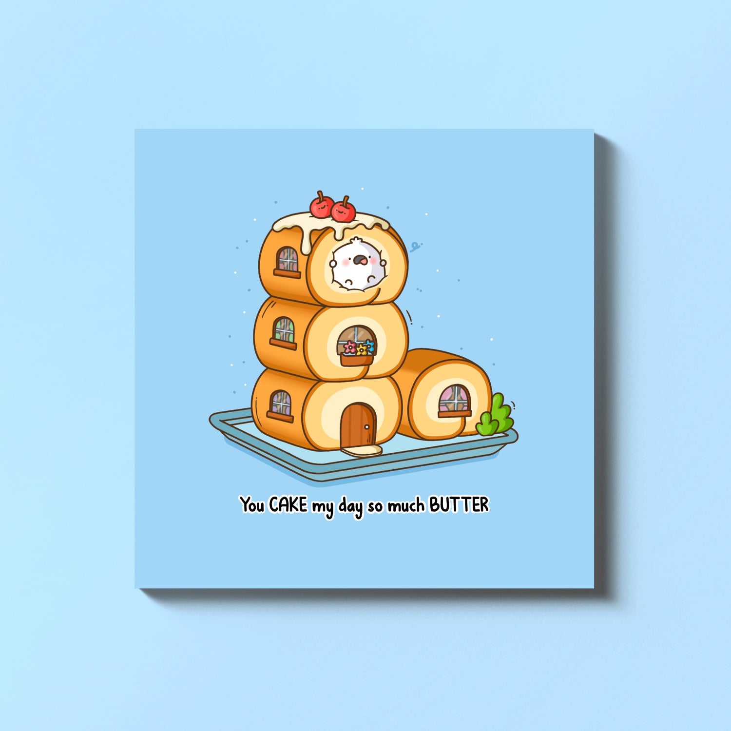 Cake rolls card on blue table