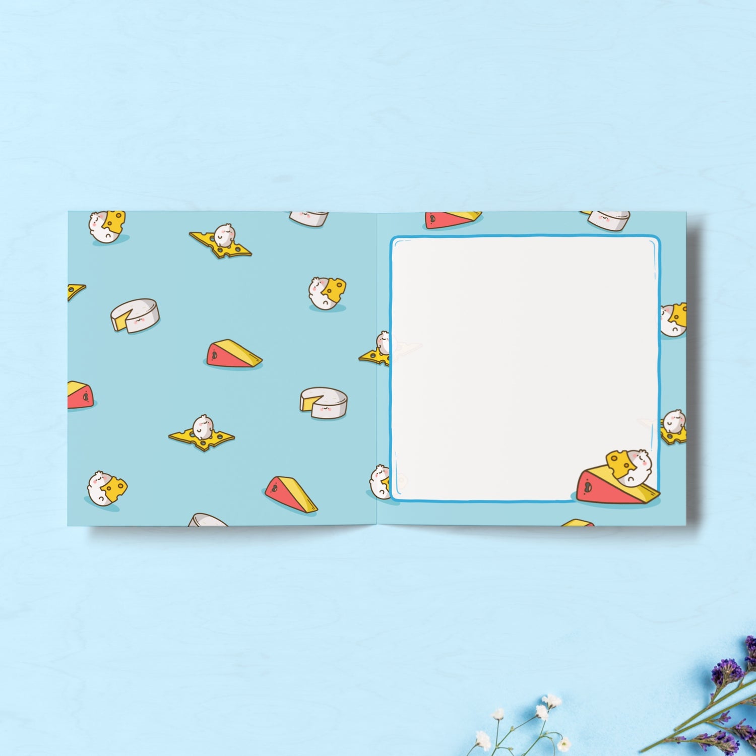 Cheese print inside card on blue table