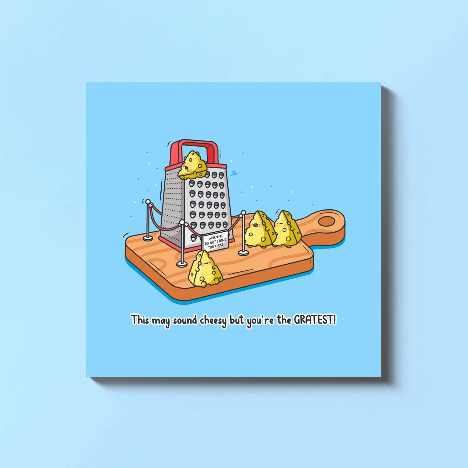 Cheese grate card on blue background