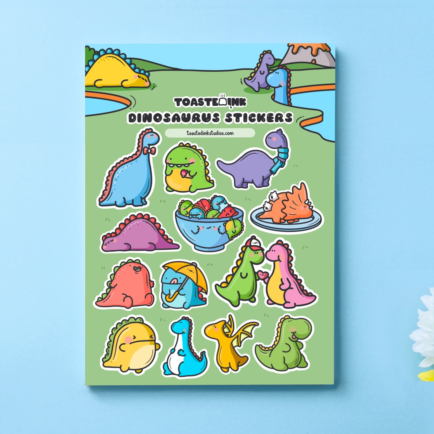 Dinosaur sticker sheet on blue table