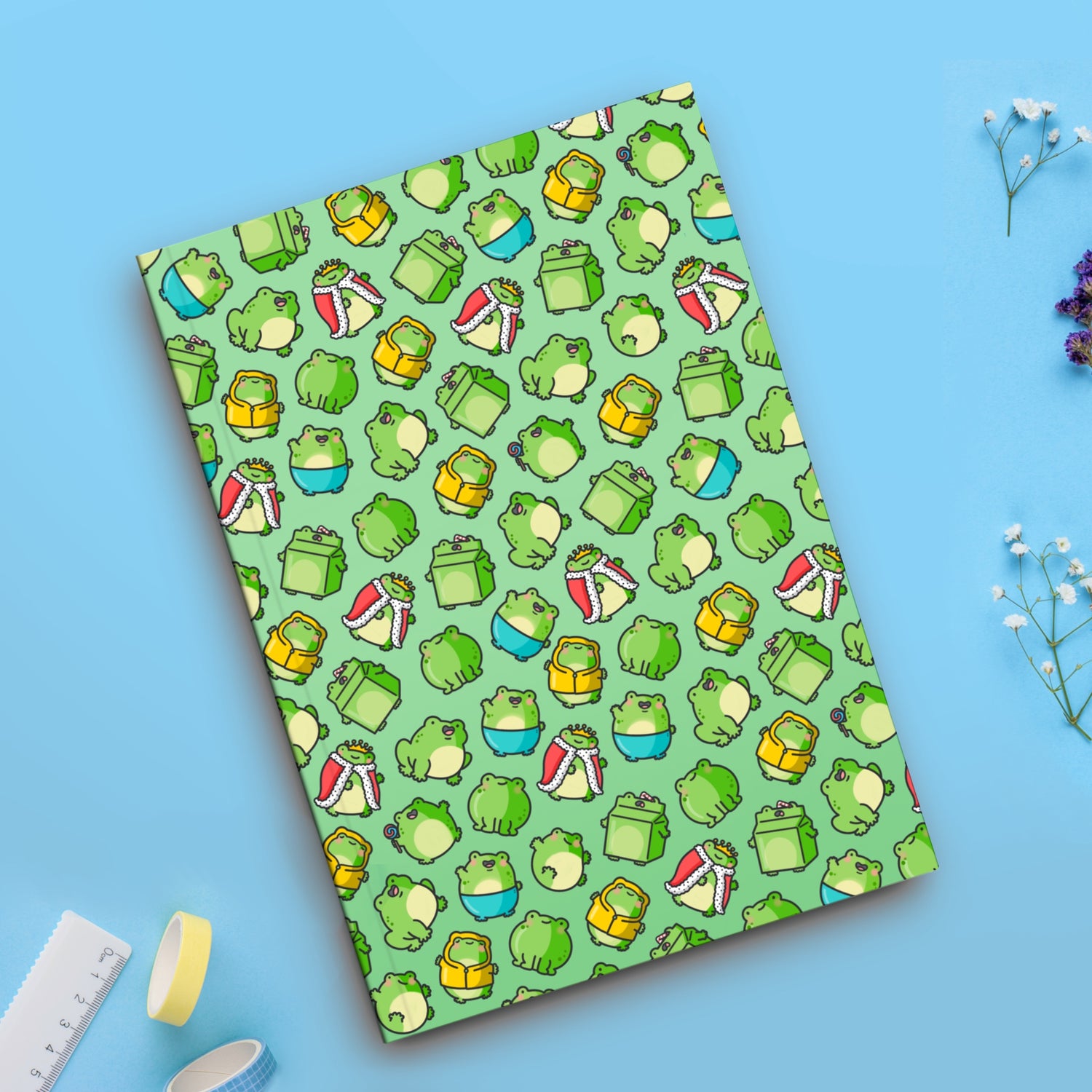 Frog notebook on blue table