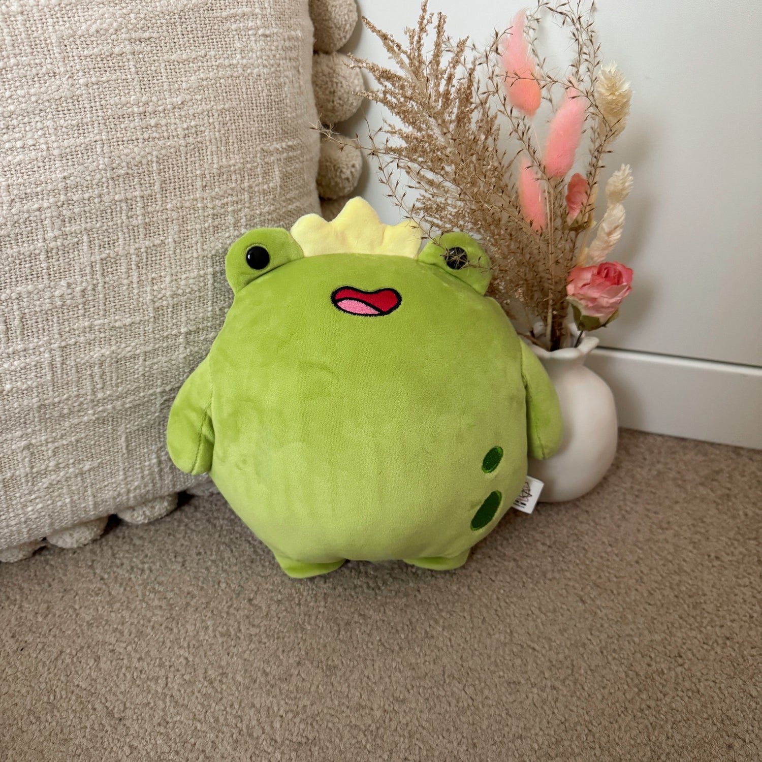 Cute frog plush with flowers