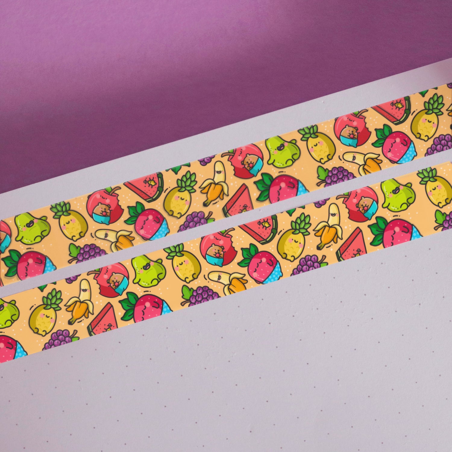 Fruit washi tape on notebook and purple background