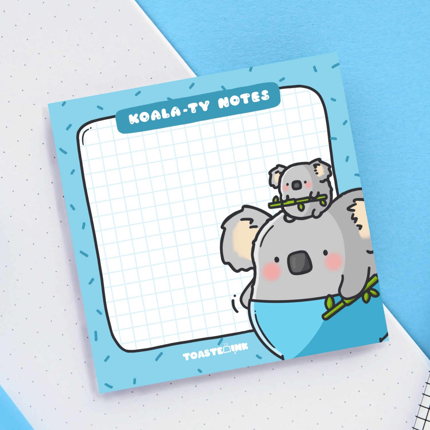 Koala sticky notes on white and blue table