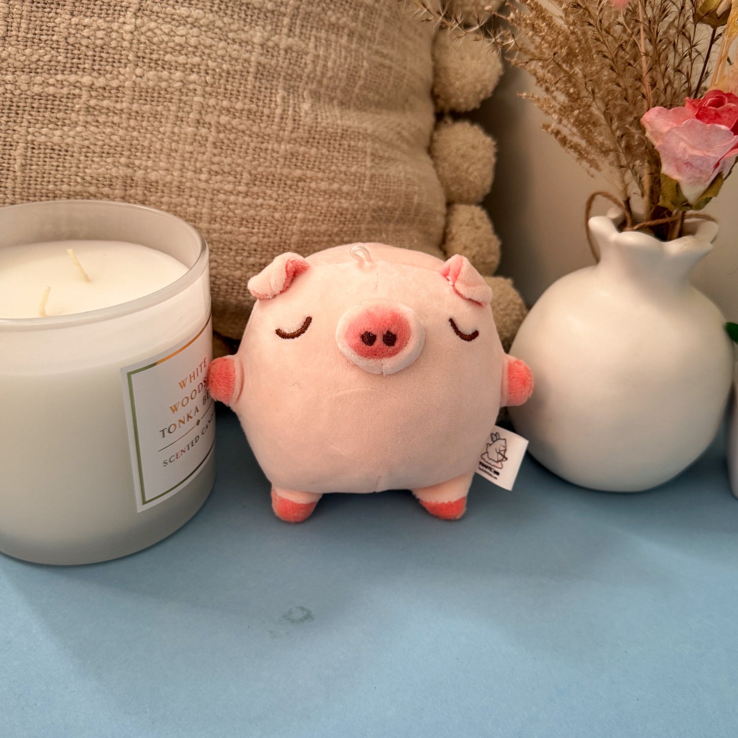 Pig keychain plush with candle