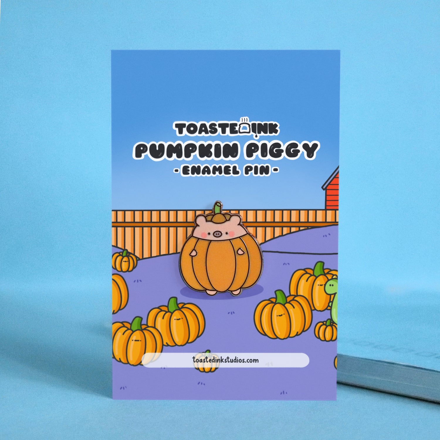 pig dressed as pumpkin enamel pin on farm backing card