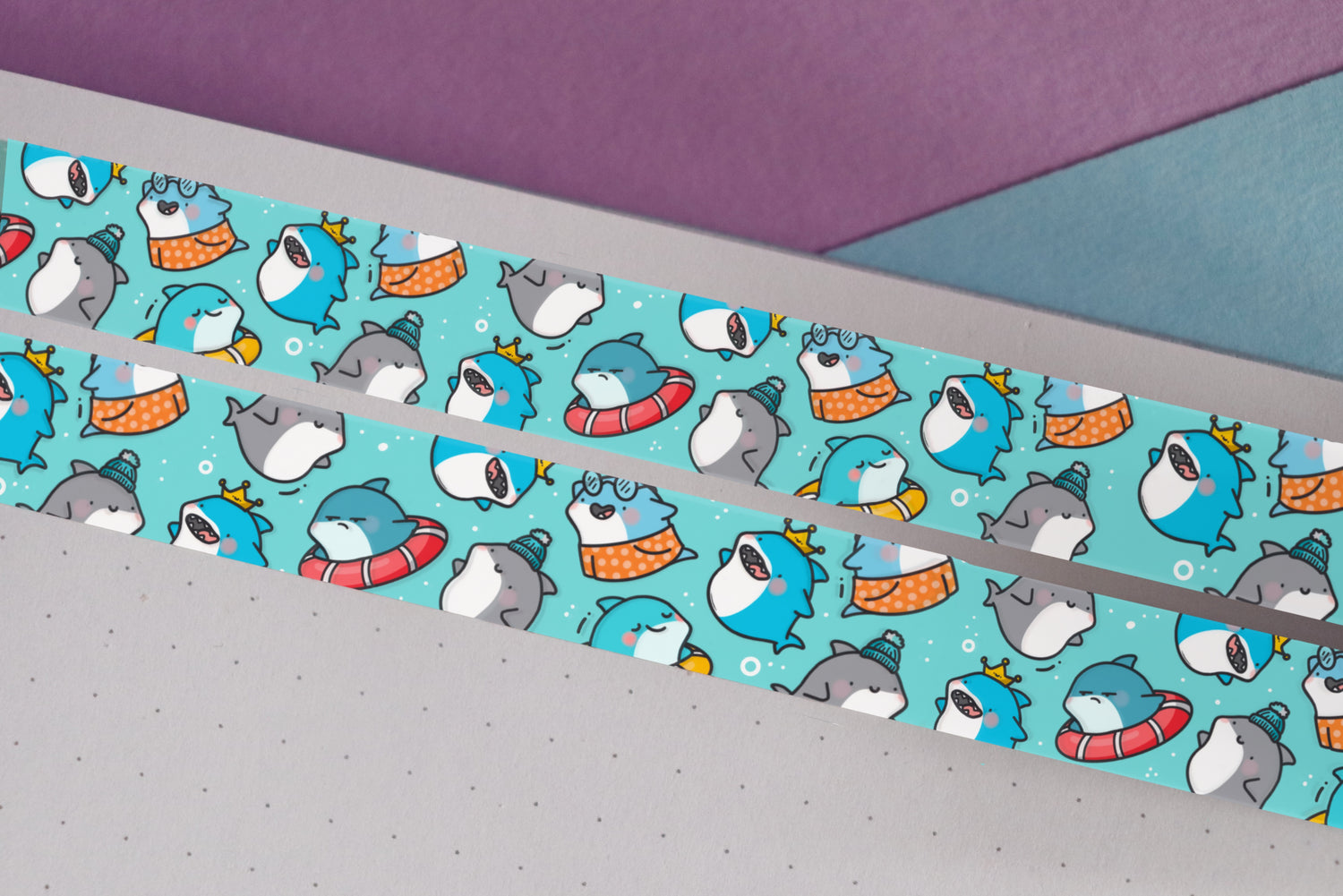 Blue shark print washi tape on purple and blue table