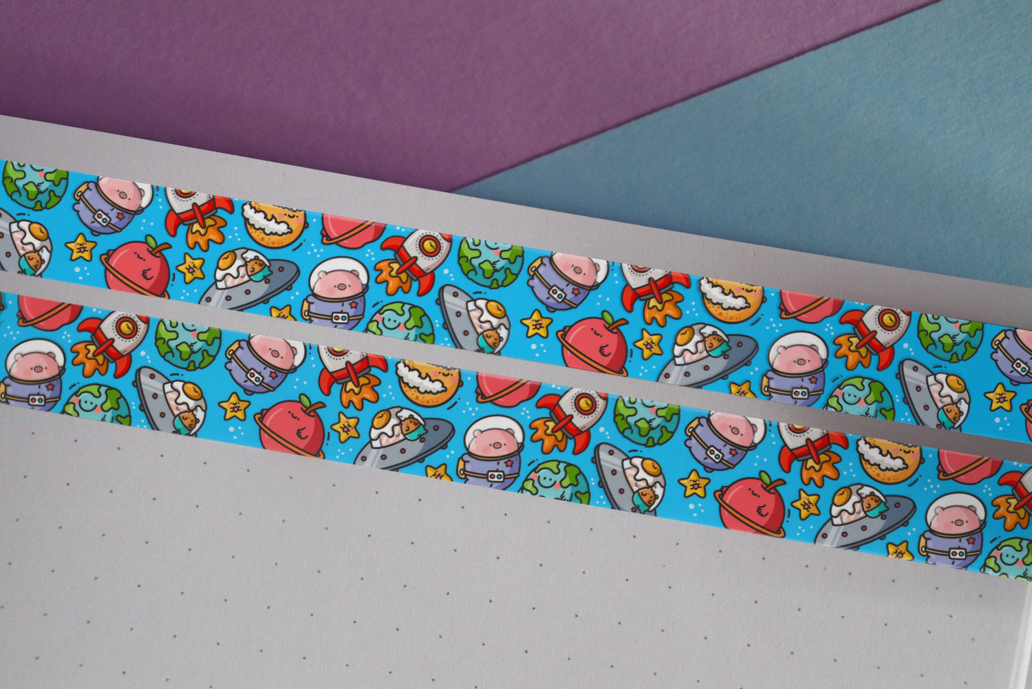Space washi tape on purple and blue table