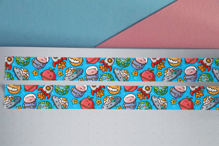 2 strips of Space washi tape on notebook