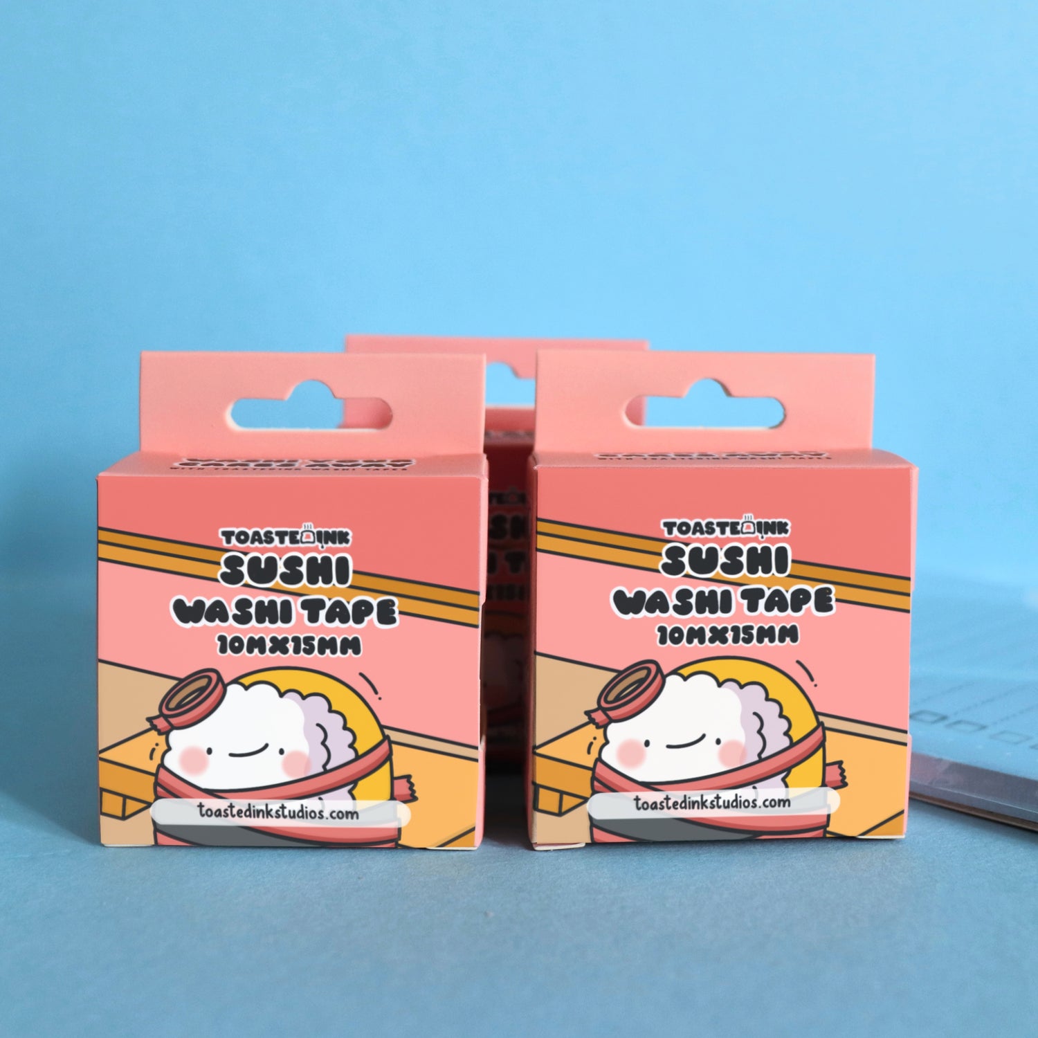 Sushi washi tape box on blue table