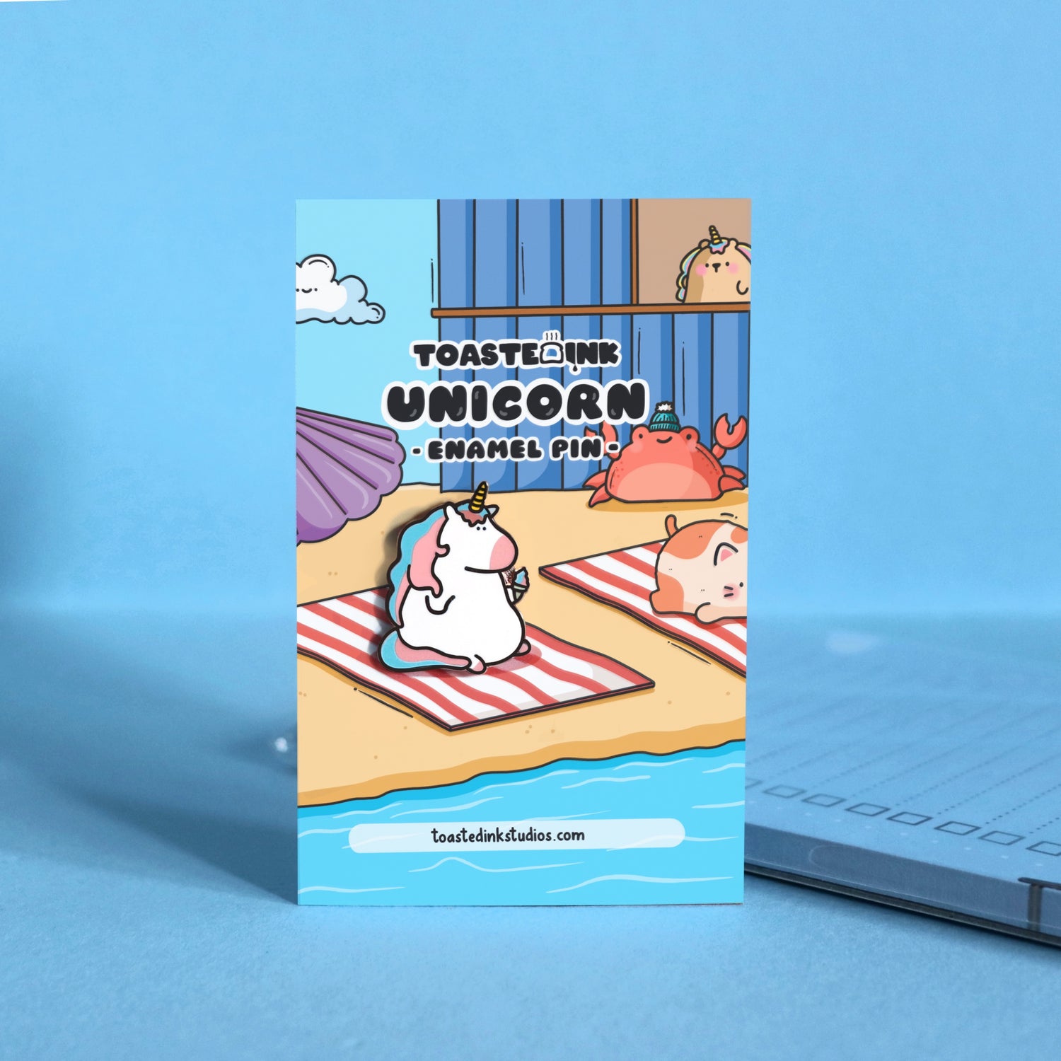 Unicorn enamel pin on beach theme backing card