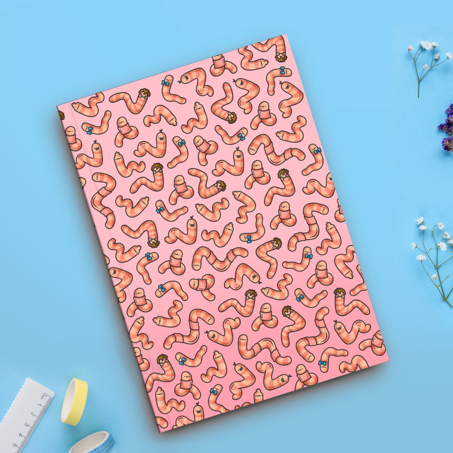 Worm notebook on blue table