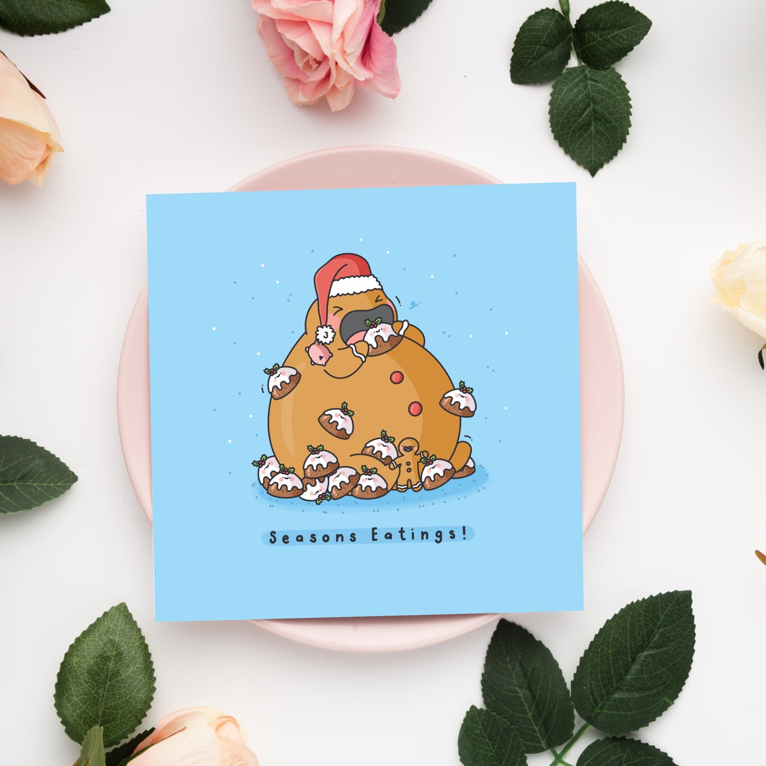 Christmas pudding card on pink plate