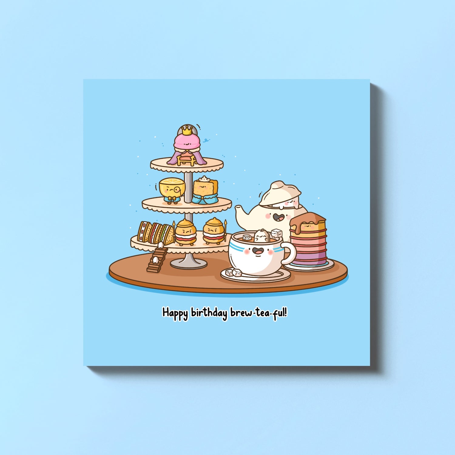 Afternoon tea birthday card on blue table