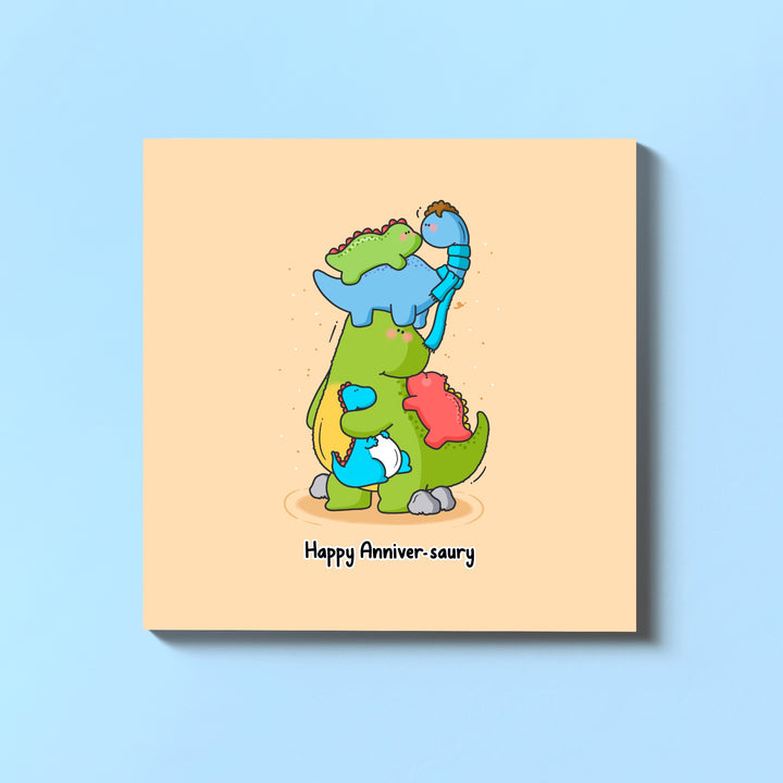 Dinosaur anniversary card on blue table