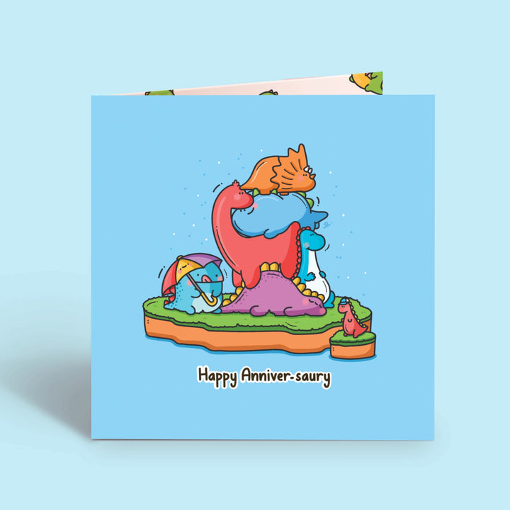 Dinosaur Anniversary Card on blue desk
