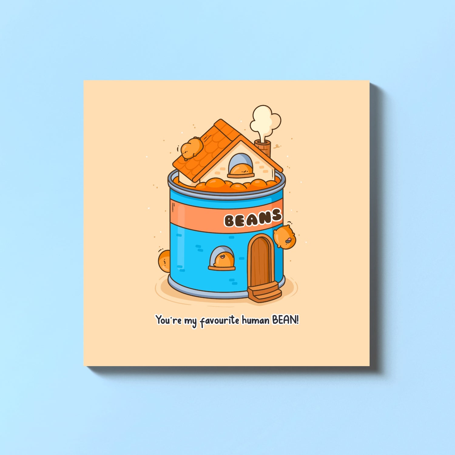Baked beans card on blue table