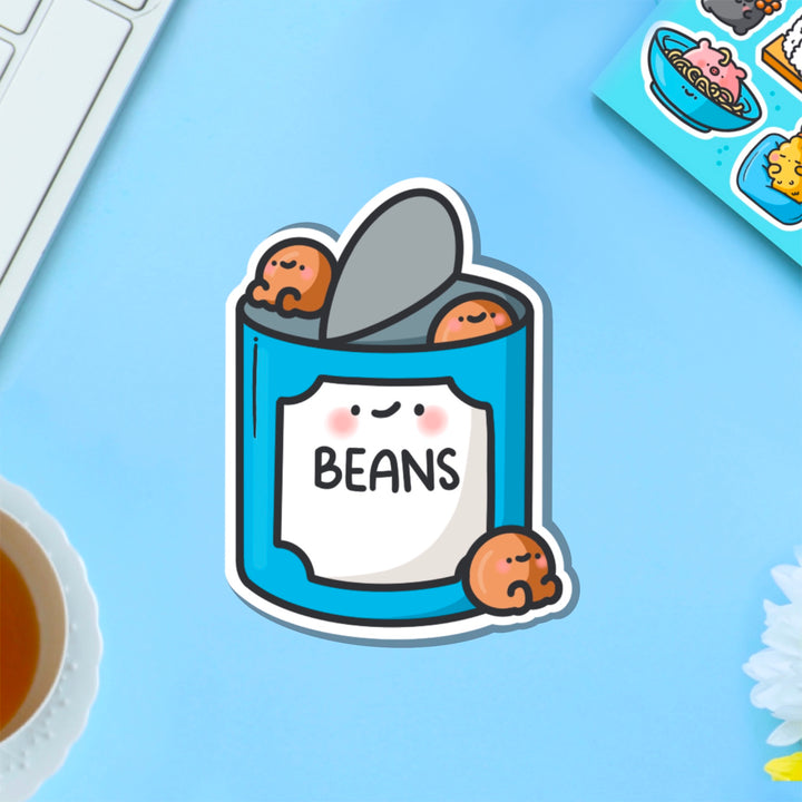 Baked beans vinyl sticker on blue table