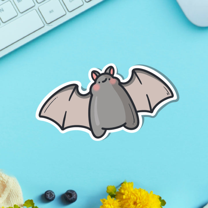 Bat vinyl sticker on green table