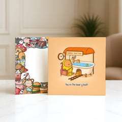 Bear bath card with Toastedink envelope on marble table
