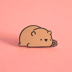 Brown bear enamel pin on pink background