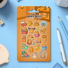 Bear sticker sheet on blue desk with stationery scattered around