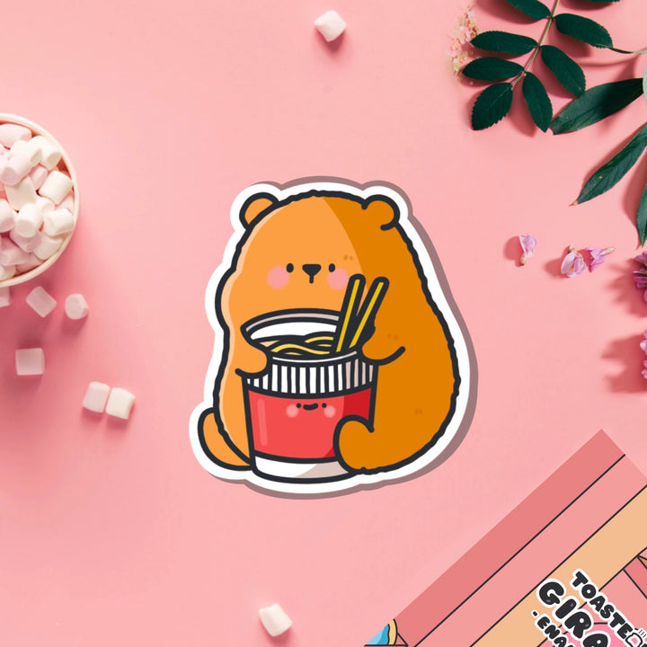 Bear with noodles vinyl sticker on pink table