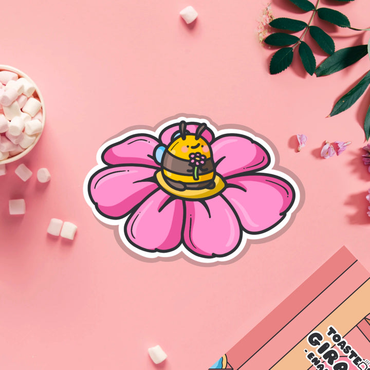 Bee on a flower vinyl sticker on pink table