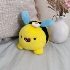 Bee plush with flower on its head