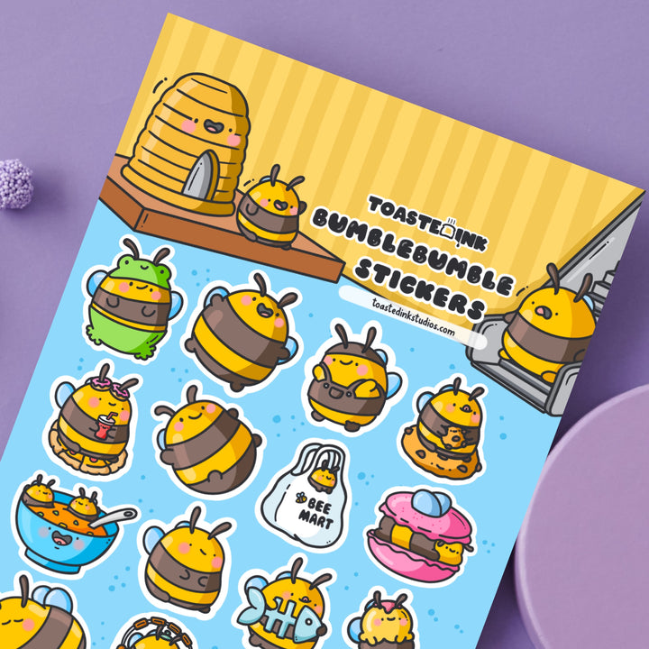 Bee sticker sheet on purple table