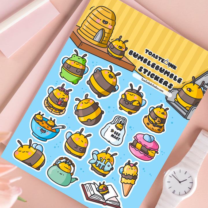 Bee sticker sheet on pink table