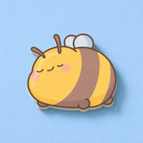 Sleeping Bee Shaped Sticky Notes on blue table