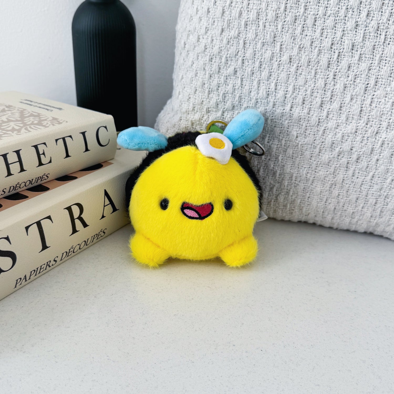 Bee plush keychain with cushion and books