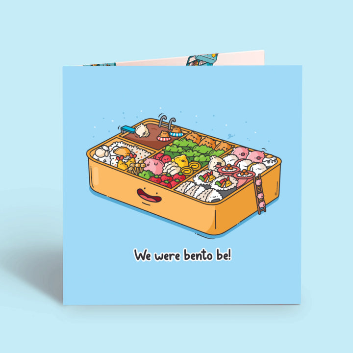 Bento Box Card on blue desk