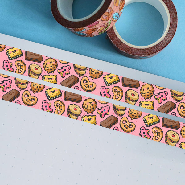 Pink biscuit washi tape on blue table with 2 rolls of washi tape