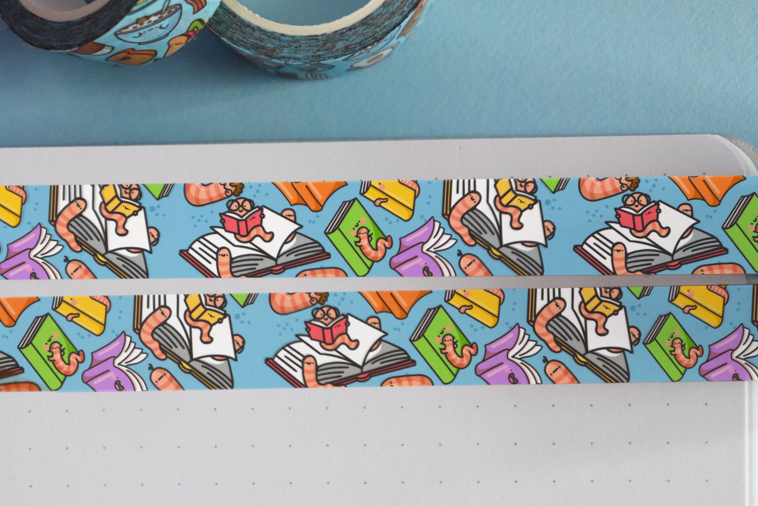 Bookworm washi tape on blue background