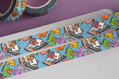 Bookworm washi tape on notebook and purple table