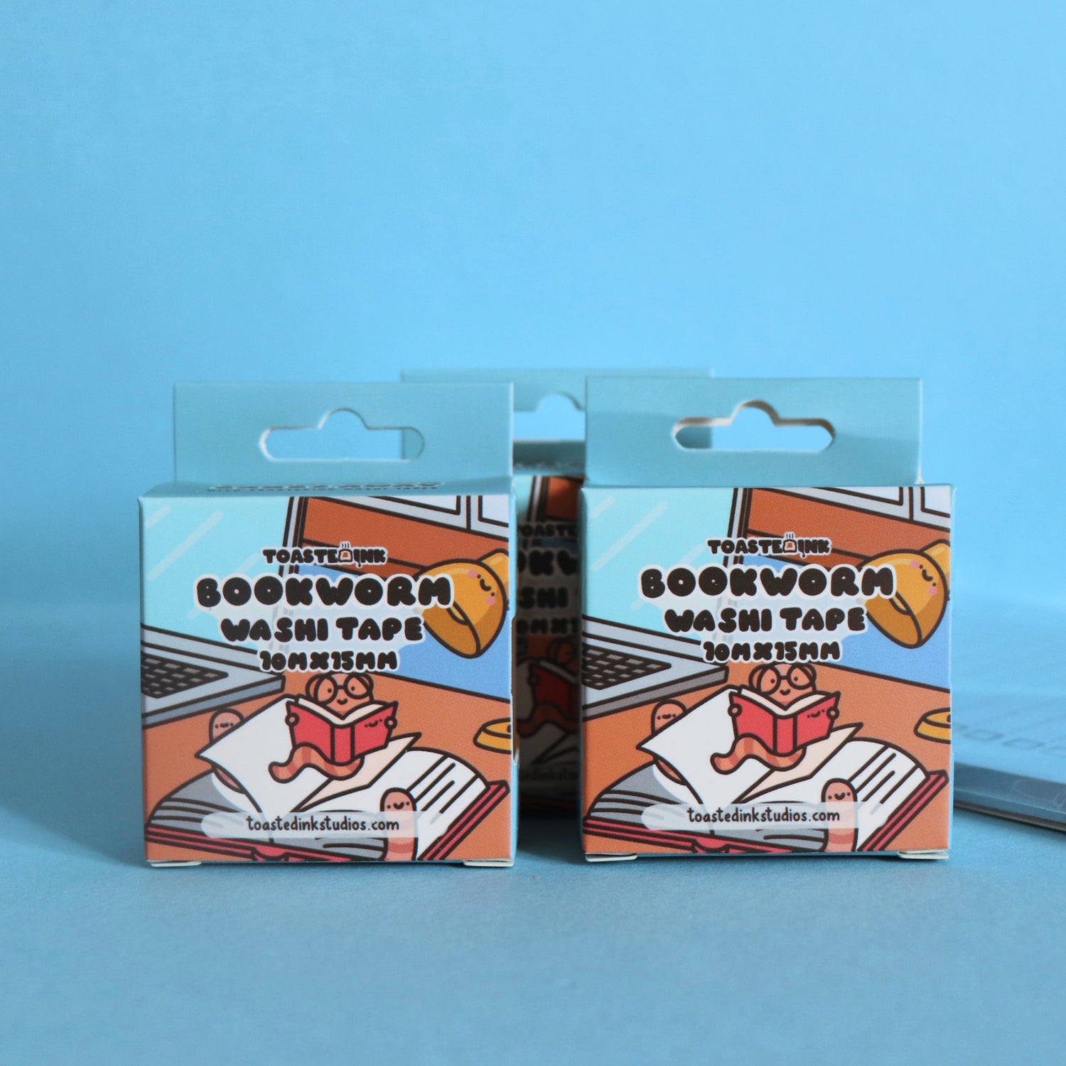 Bookworm washi tape box on blue table