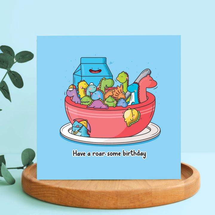 Bowl of dinosaurs Card on wooden plate