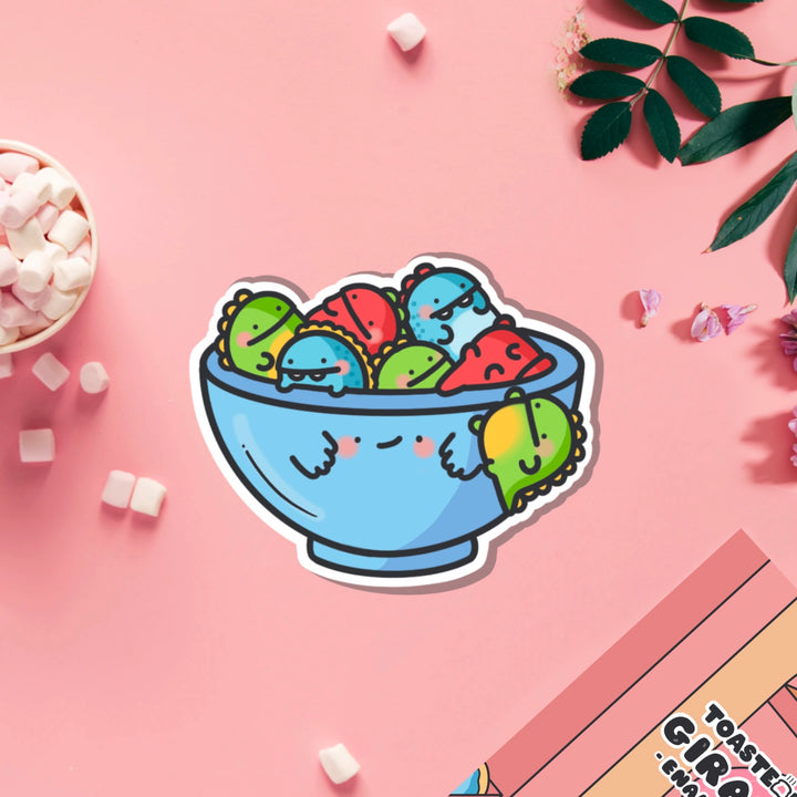 Bowl of dinosaurs vinyl sticker on pink table