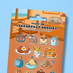 Breakfast design sticker sheet close up on blue desk