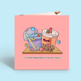 Bubble tea card on blue desk