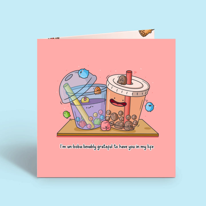 Bubble tea card on blue desk