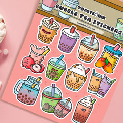 Bubble tea stickers on pink desk close up