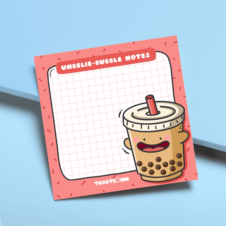 Bubble tea sticky notes on blue desk